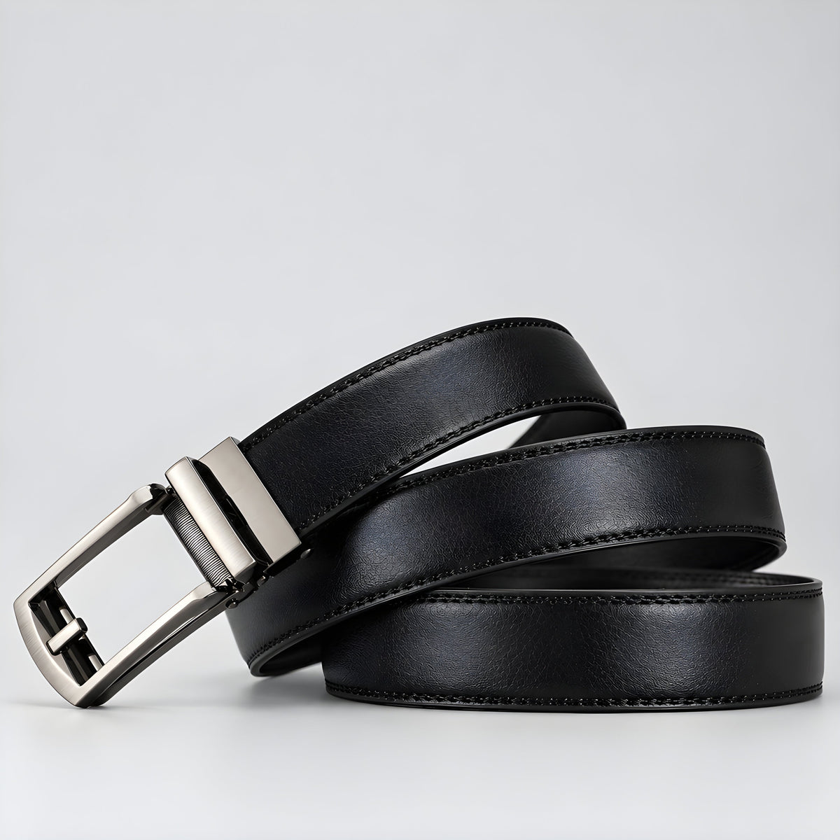 Obsidian canvas utility belt with silver rectangular buckle and stitched edge