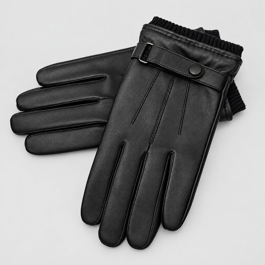 Black leather gloves with shearling cuff, snap buckle strap, and stitched fingers