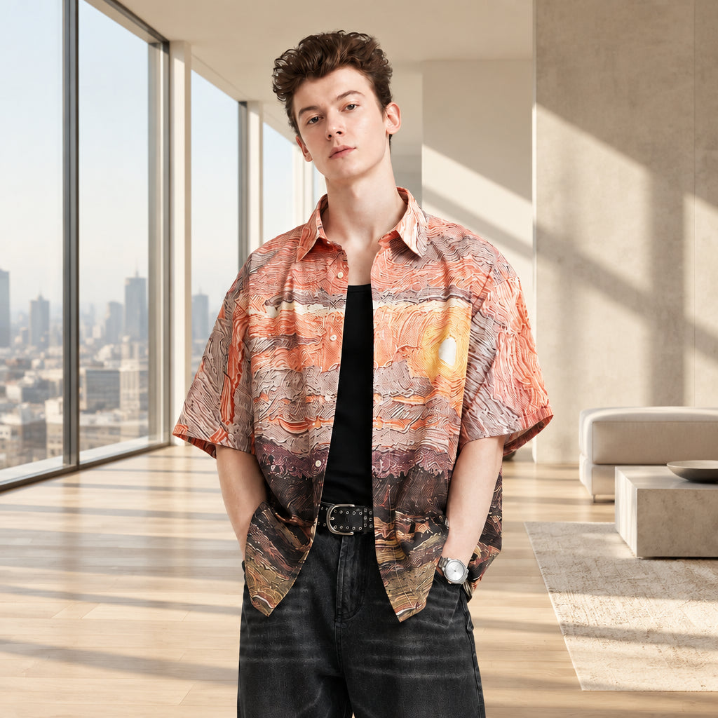 Men's seersucker short-sleeve button shirt with abstract orange, purple, and brown print