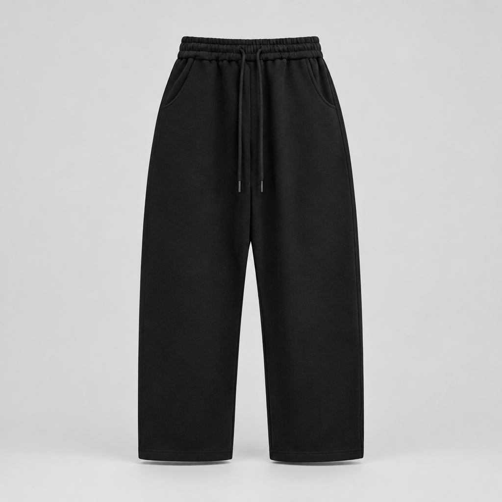 Black relaxed sweatpants with ribbed elastic waistband, drawstring ties, wide straight legs