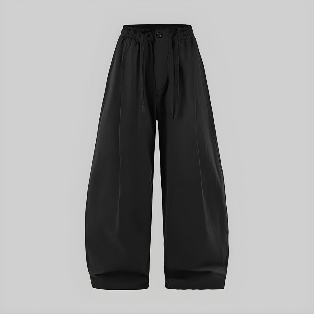 Dark linen wide-leg trousers with elastic waist, button front, pleated legs