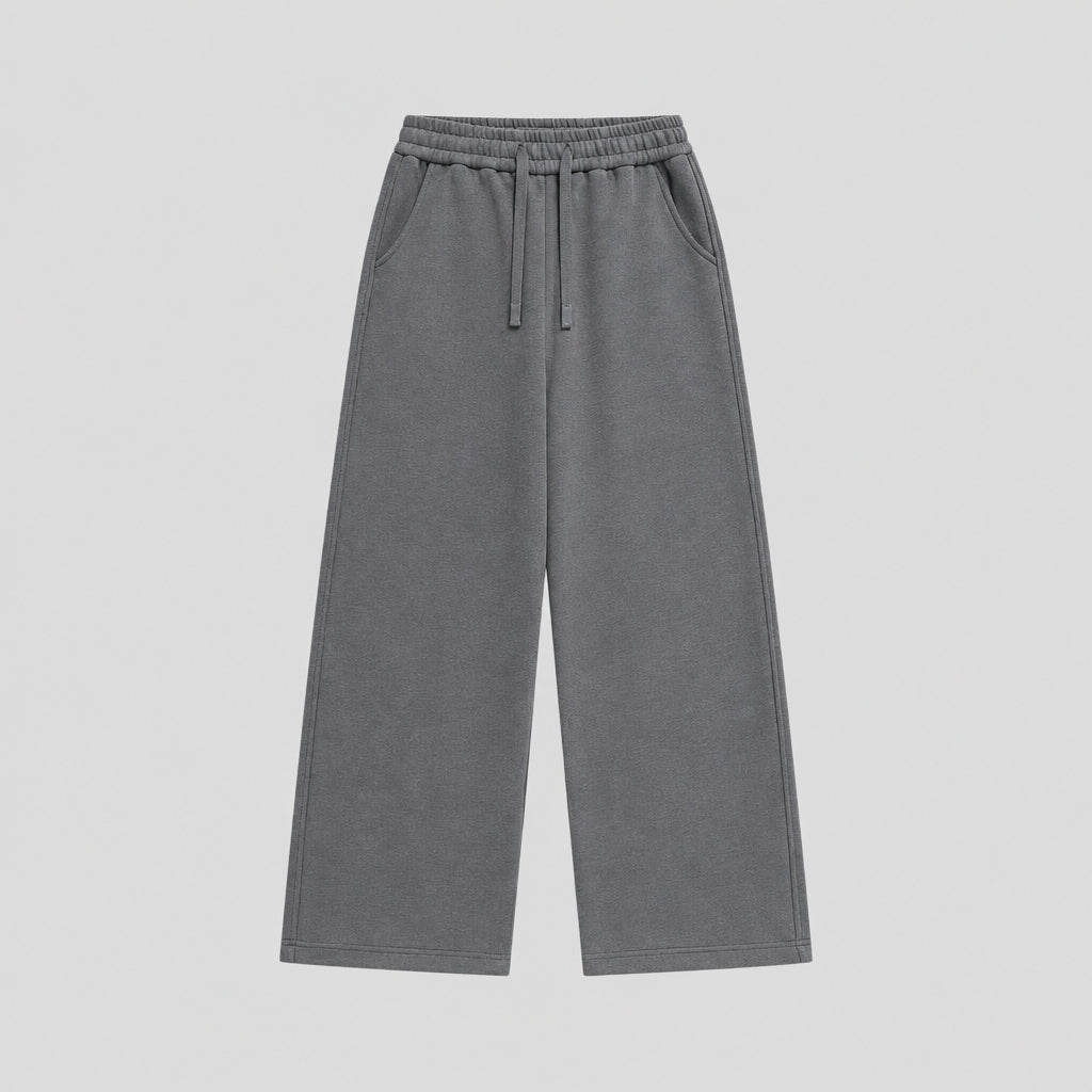 Charcoal gray relaxed sweatpants with elastic waistband and drawstring, wide straight legs