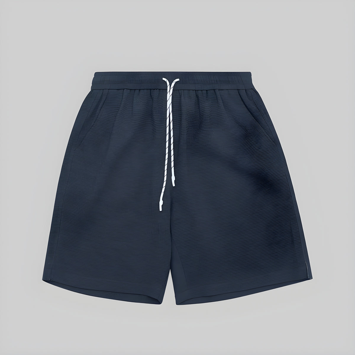 Waffle lounge shorts in dark blue, elastic waistband with white drawstring, relaxed fit.