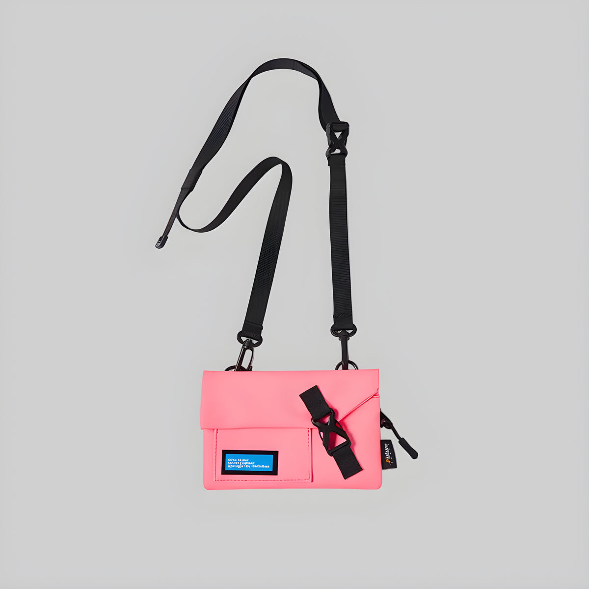 Slim crossbody bag with adjustable shoulder straps, pink body, front patch pocket