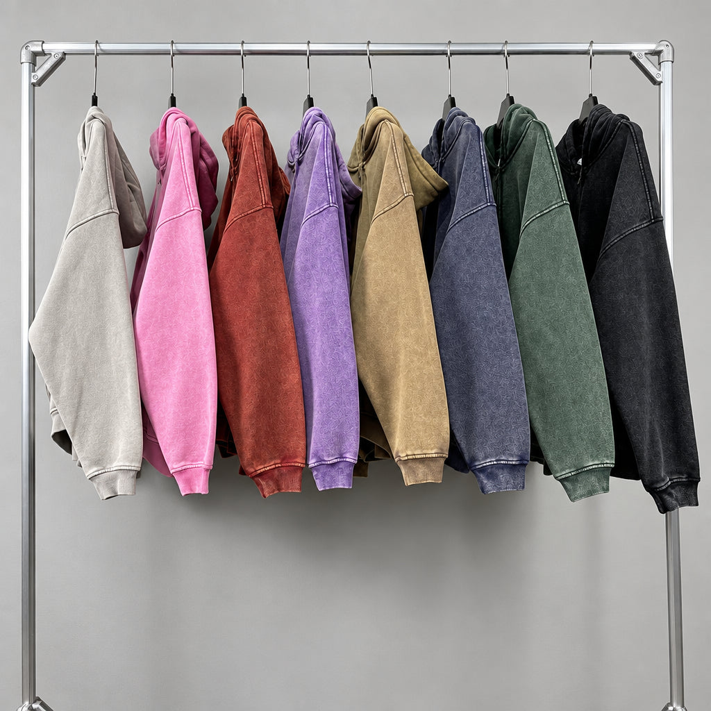 Zip-through hoodie assortment with multiple colors, including gray, violet, pink, and green