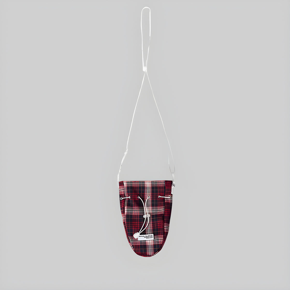 Red plaid neck pouch with drawstring closure and hanging strap