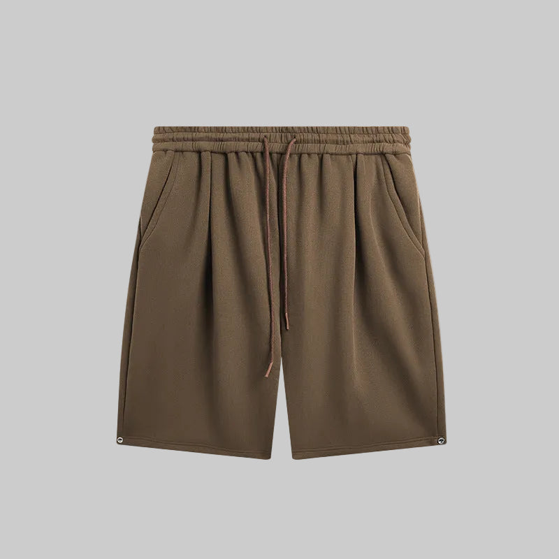 Relaxed utility shorts in brown with elastic waistband and drawstring tie