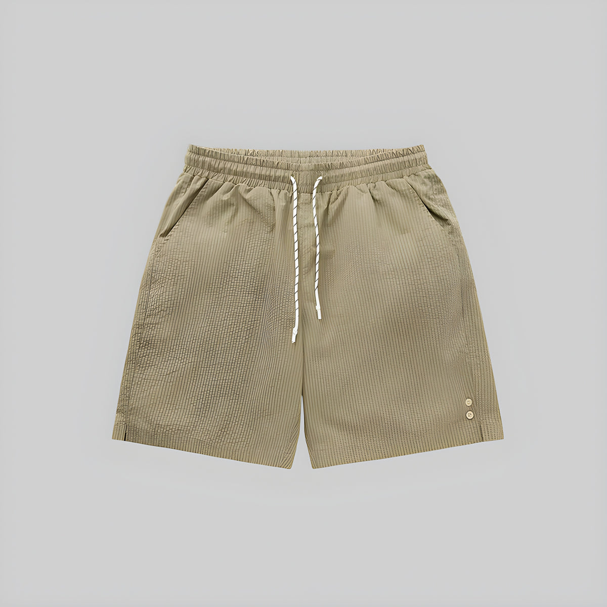 Light khaki seersucker shorts with elastic waistband and white drawstring; side eyelet details