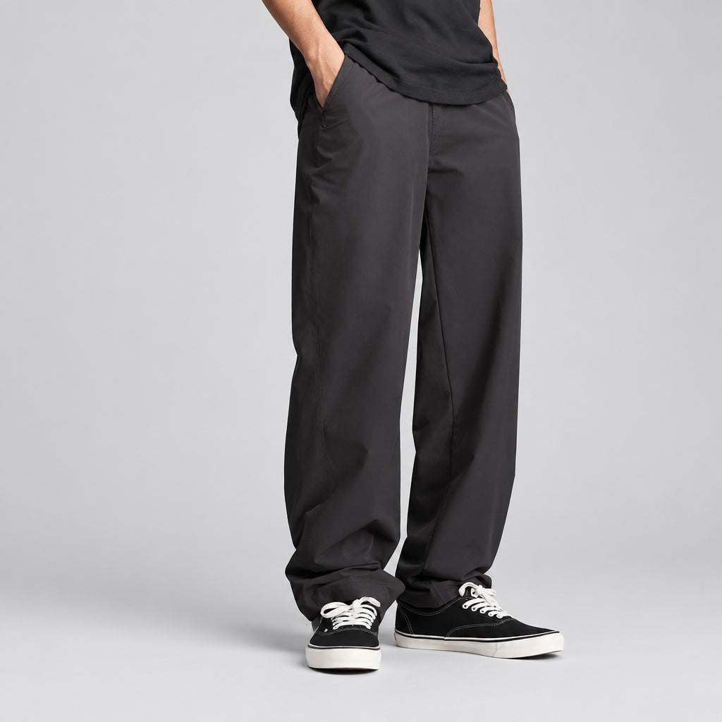Charcoal technical hiking trousers with drawstring waist and relaxed straight legs