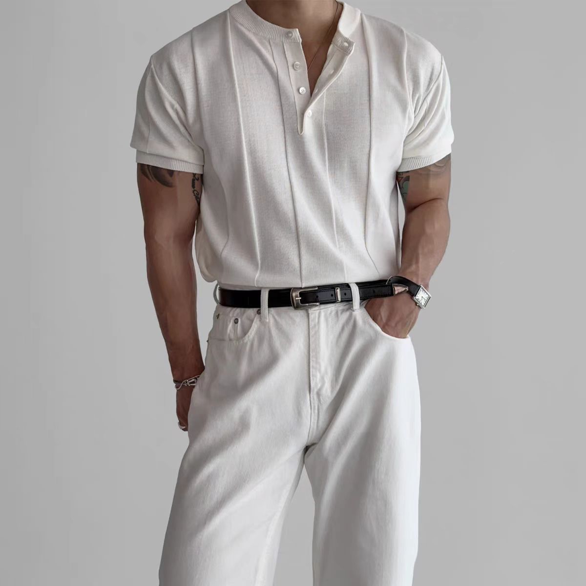 Ecru knit henley shirt with three-button placket and ribbed collar