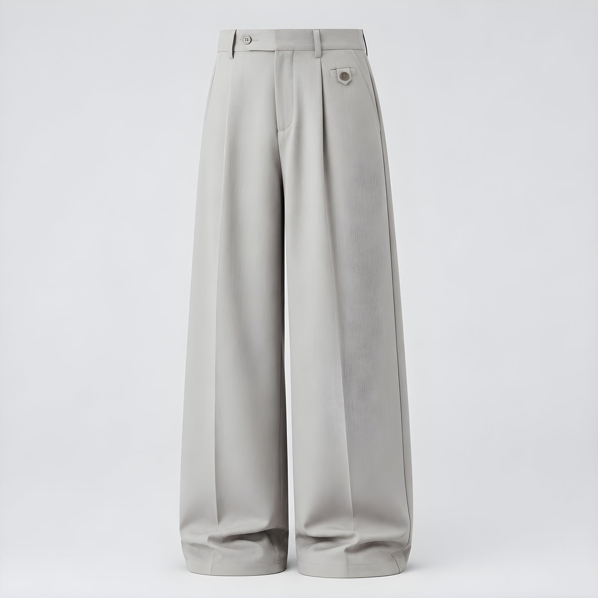 Pleated drape trousers in ecru, wide-leg silhouette with front pleats and button closure.