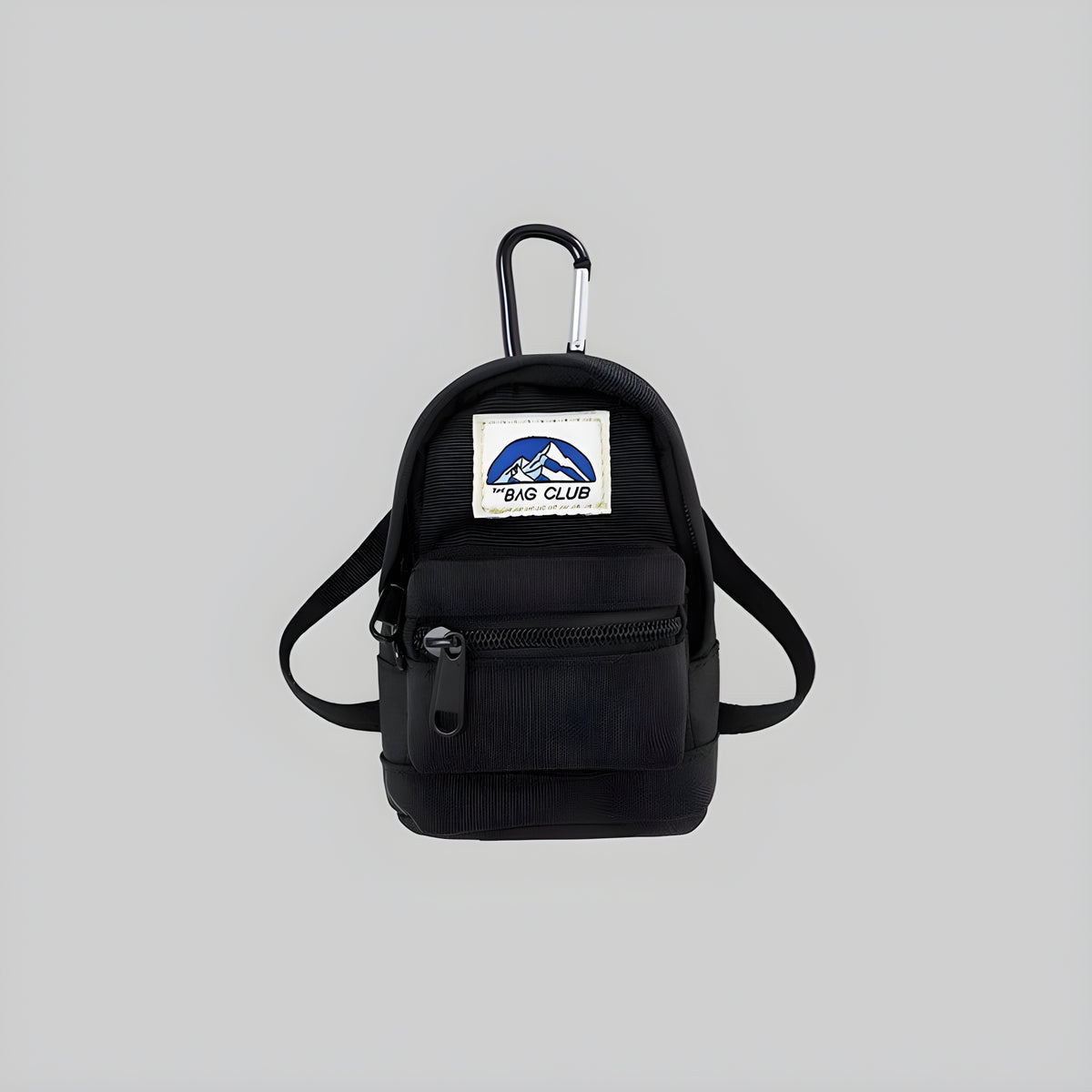 Black mini backpack pouch with top handle, front zip pocket, and BAG CLUB patch