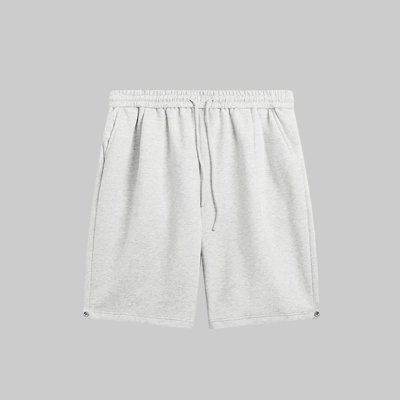 Relaxed utility shorts in off-white with elastic waistband and drawstring tie
