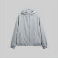 Grey zip-front hoodie with adjustable hood and drawstring, featuring stitched panel seams