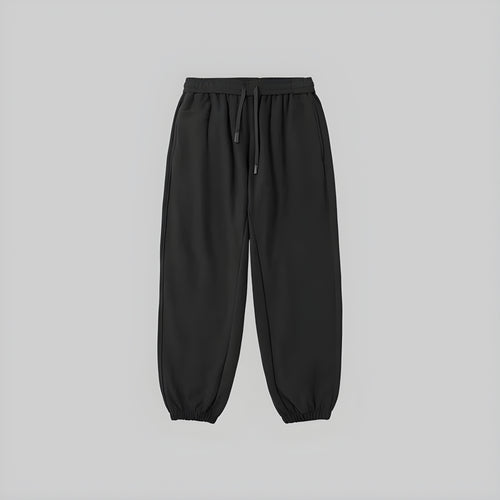 Brushed relaxed sweatpants in black, elastic waistband with drawstring, cuffed ankle hems