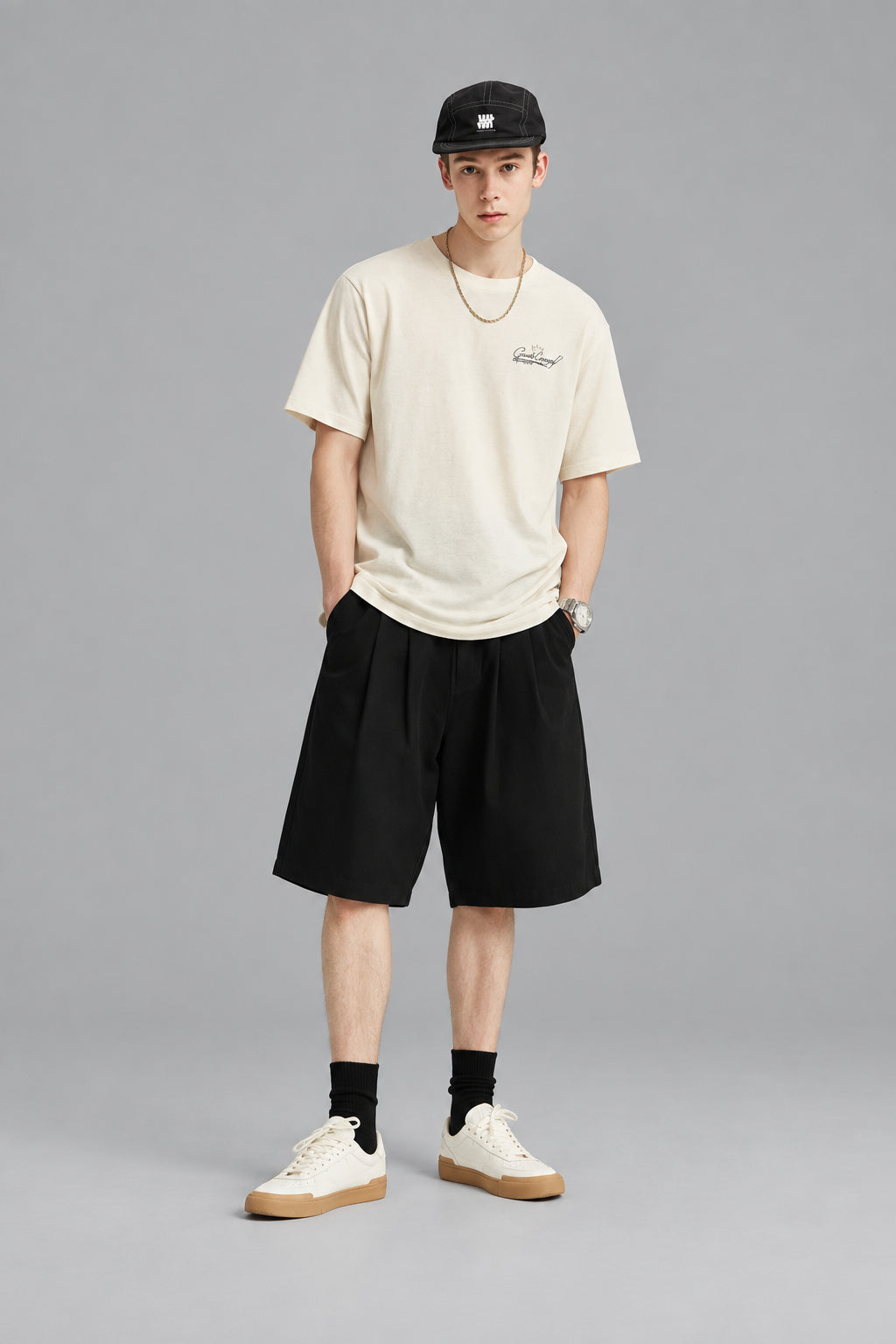 Black pleated suit shorts with front pleats and button waistband