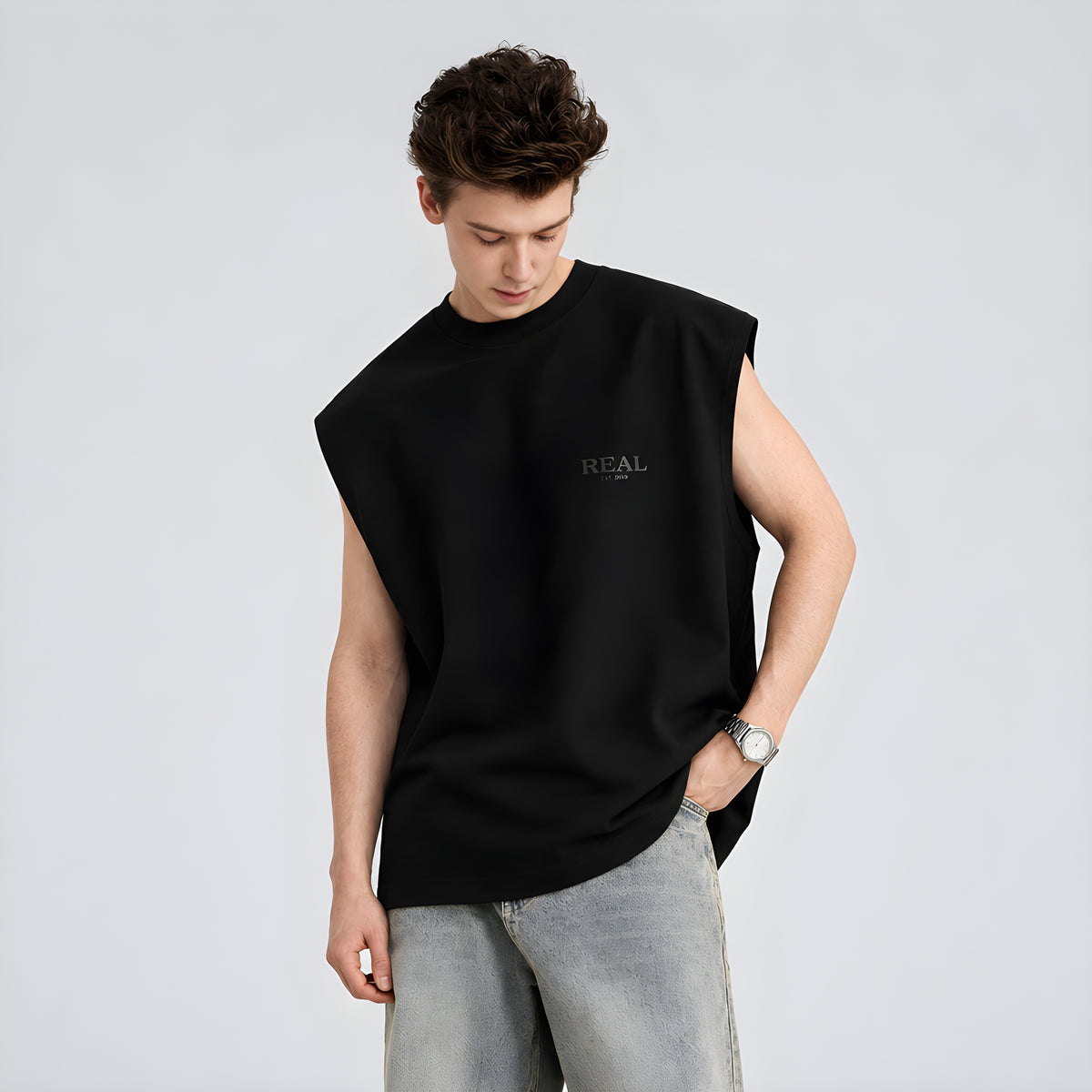 Black sleeveless crew-neck vest with small flocked chest logo