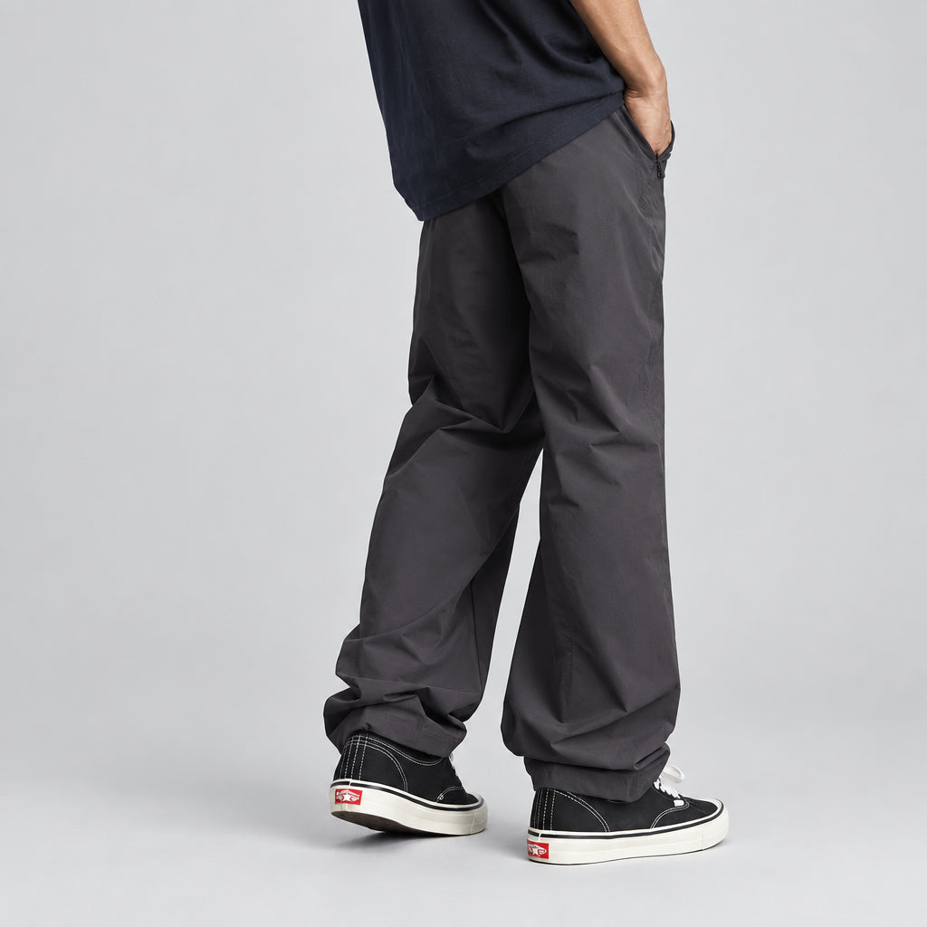 Charcoal technical hiking trousers with roomy fit and cuffed hems