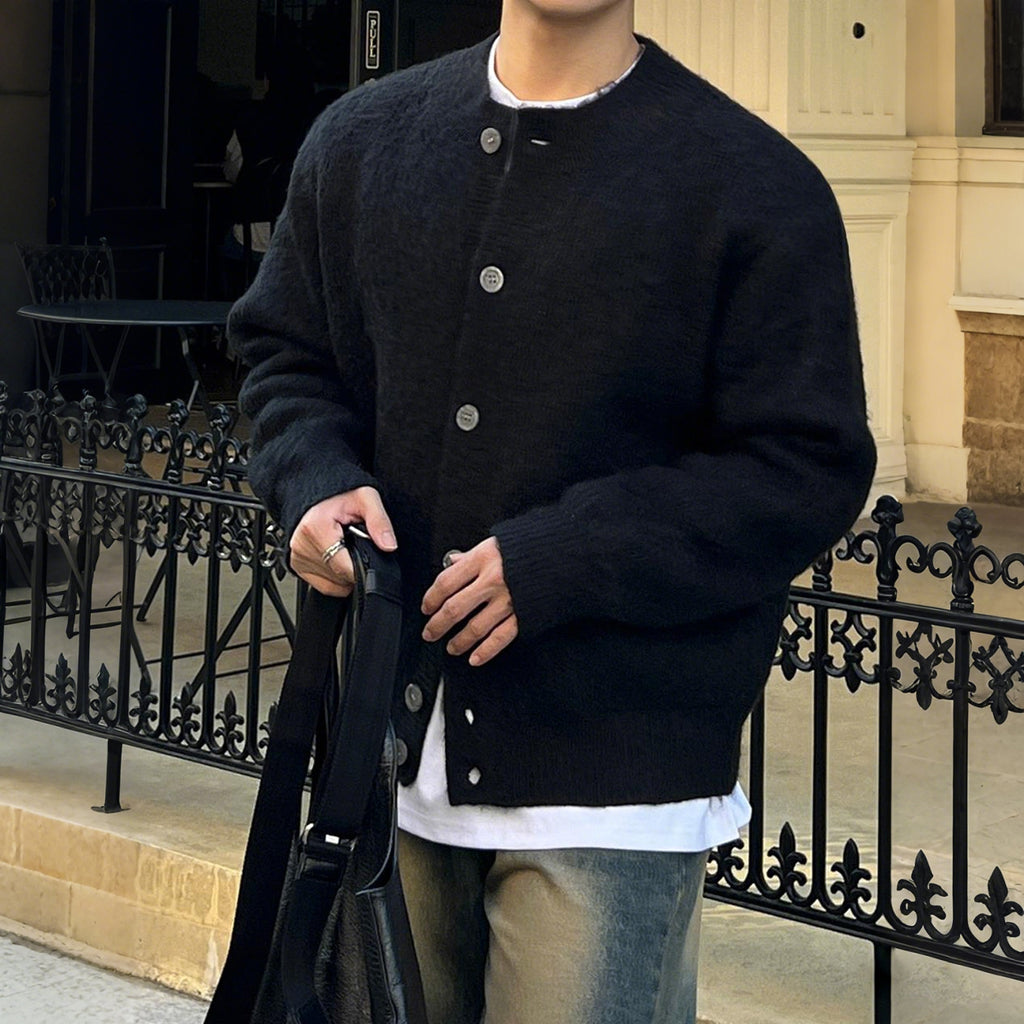 Obsidian textured merino cardigan with four-button placket and ribbed knit trim