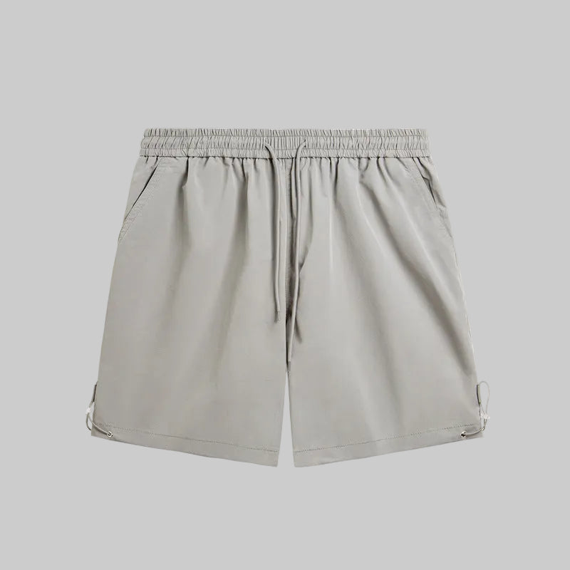 Light gray utility pocket shorts with elastic waistband, drawstring, side pockets