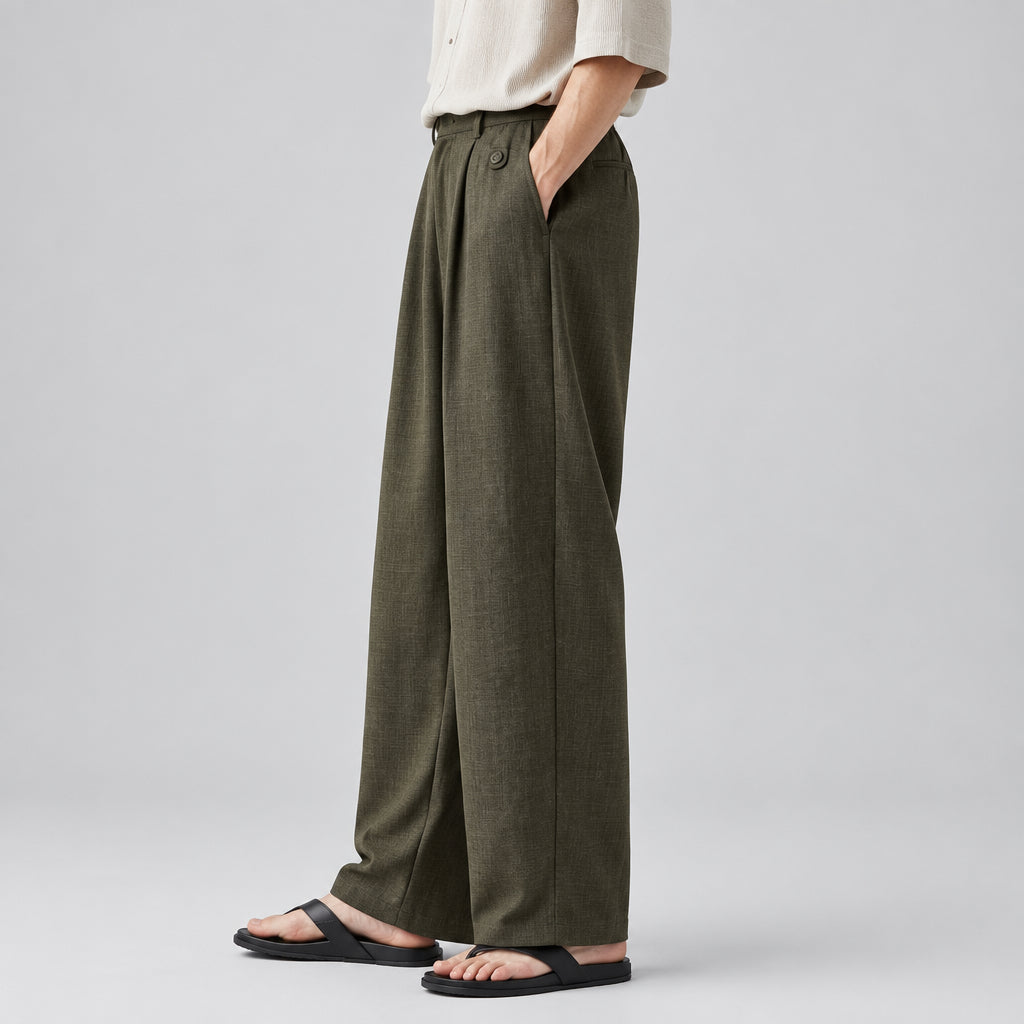 Pleated drape trousers in olive, relaxed wide-leg cut with pleats and side pockets.