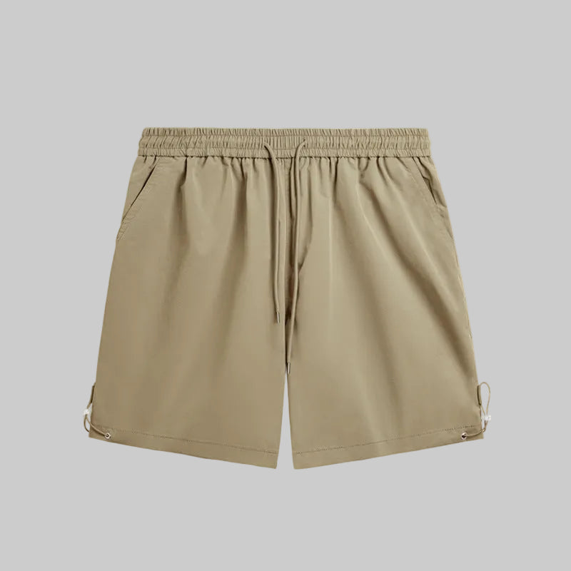 Tan utility pocket shorts with elastic waistband, drawstring, side pockets