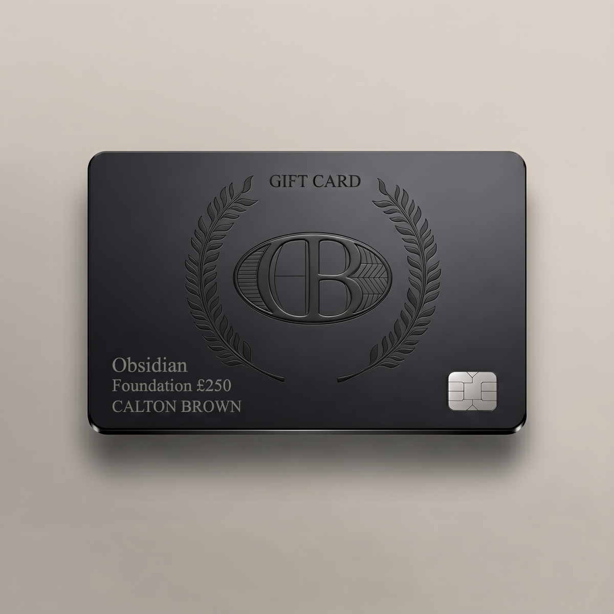 CB digital gift card in Obsidian with embossed CB monogram, laurel wreath, and £250 label.