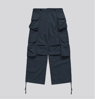 Indigo wide-leg cargo trousers front view with layered flap pockets and tie-cord hem tabs