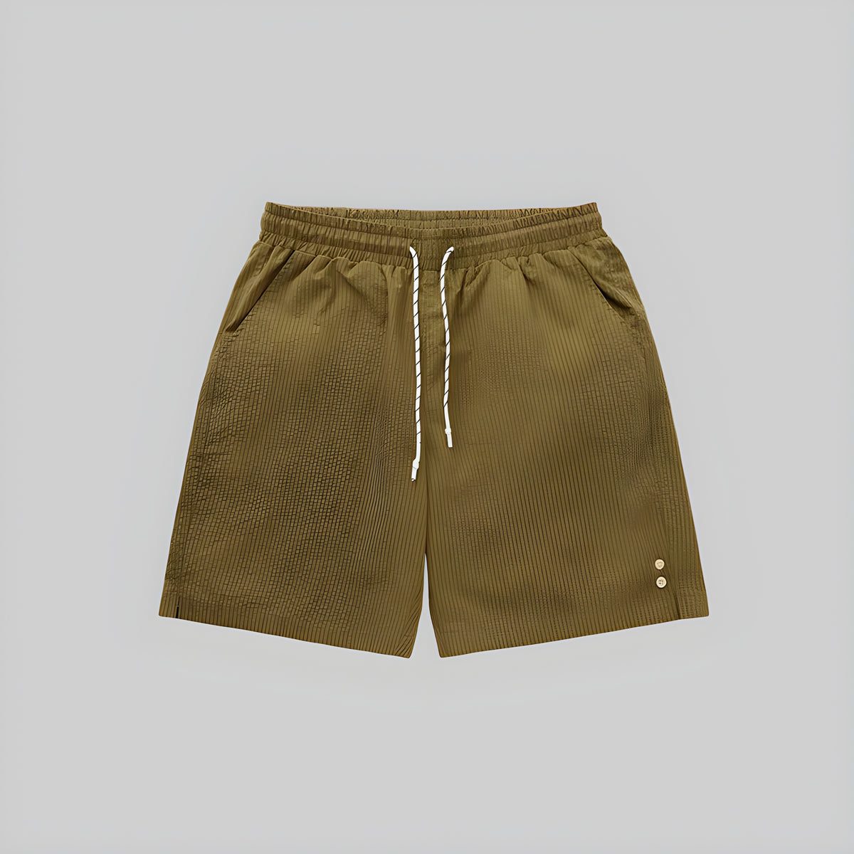 Khaki seersucker shorts with elastic waistband and white drawstring; side eyelet accents