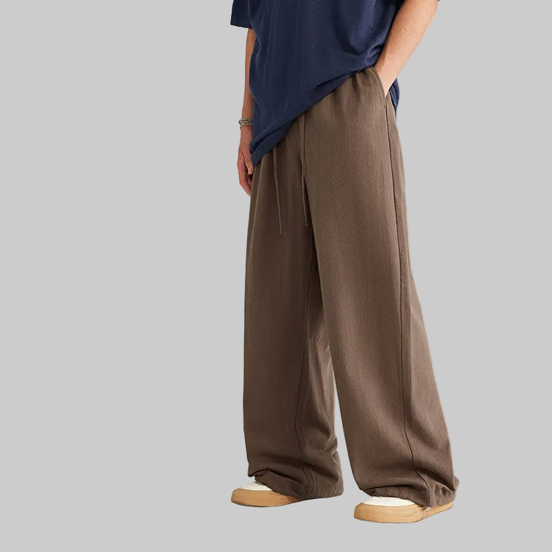 Walnut brown linen-blend wide-leg trousers with drawstring, elastic waist, and side pockets