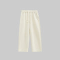 Relaxed wide-leg trousers in light apricot, elastic waistband with drawstring