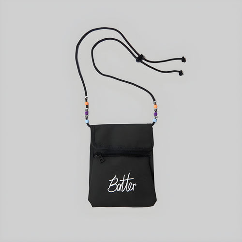 Black cord pouch with front zipper pocket, beaded cord accents, and logo print