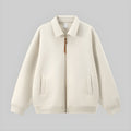 Ivory zip-up uniform jacket with stand collar, front zipper, and two side pockets