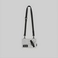 Slim crossbody bag with adjustable shoulder straps, light grey body, front patch pocket