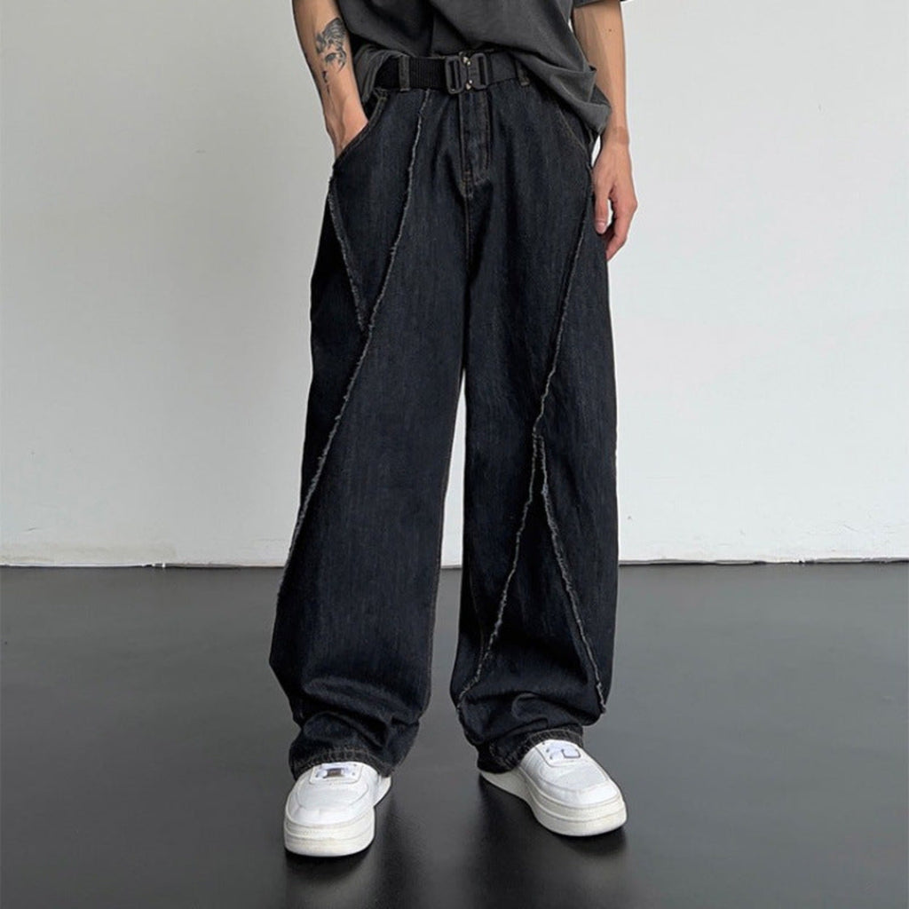 Black loose straight-leg jeans with side pockets and curved contrast stitch detailing