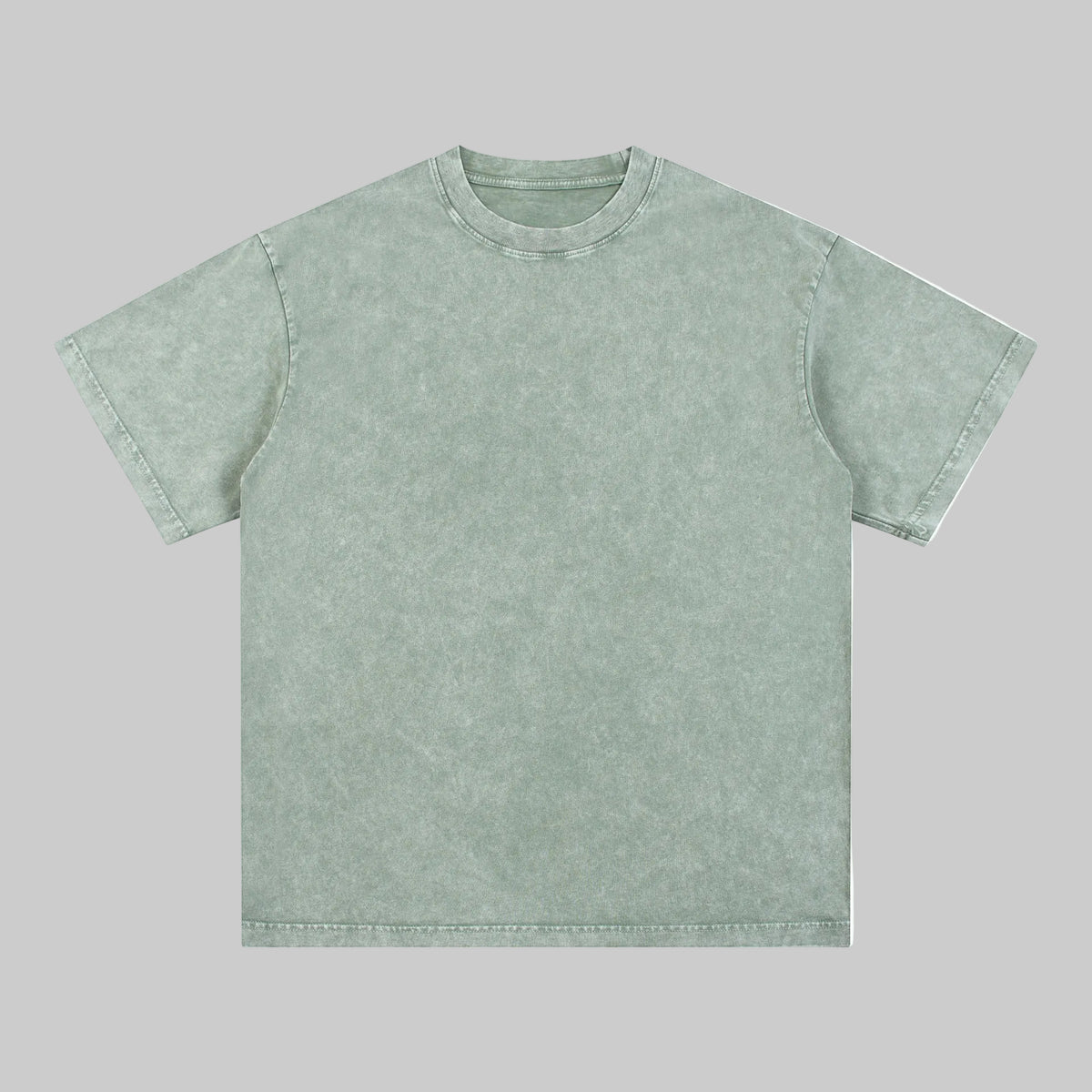Distressed crew-neck tee in muted sage green, short sleeves, plain front.