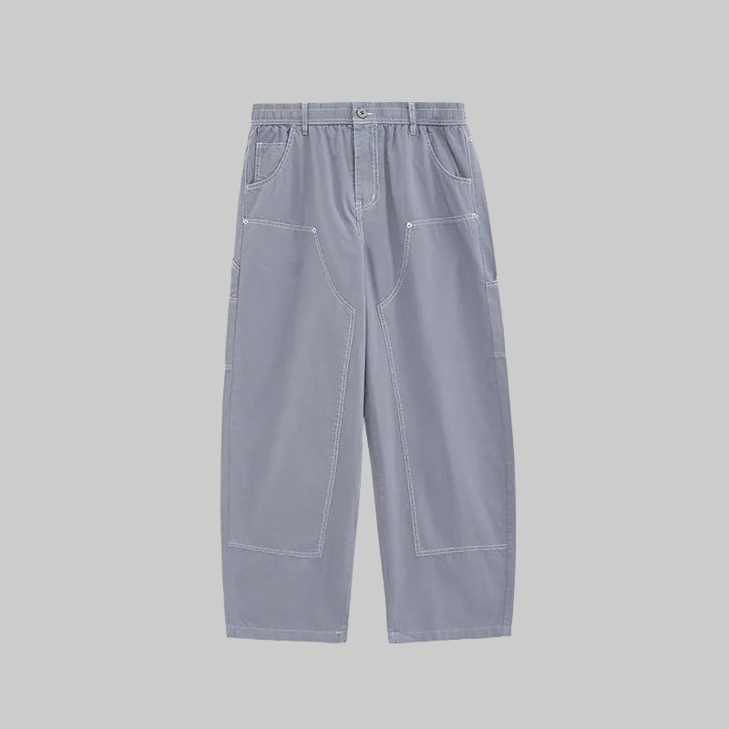 Washed cargo trousers with multiple pockets, wide leg, pale blue wash