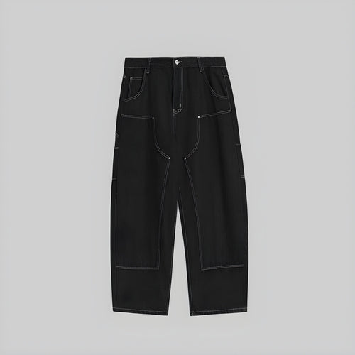 Wide-leg jeans in dark denim with contrast stitching and patch pockets