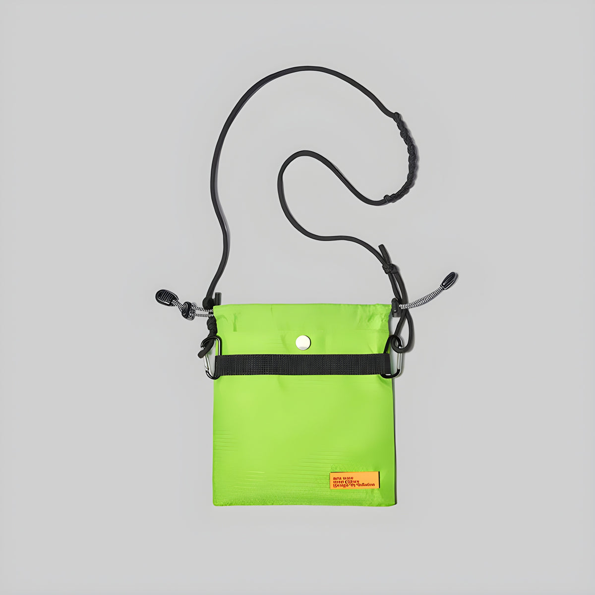 Small neon lime crossbody bag with adjustable strap and front snap button pocket