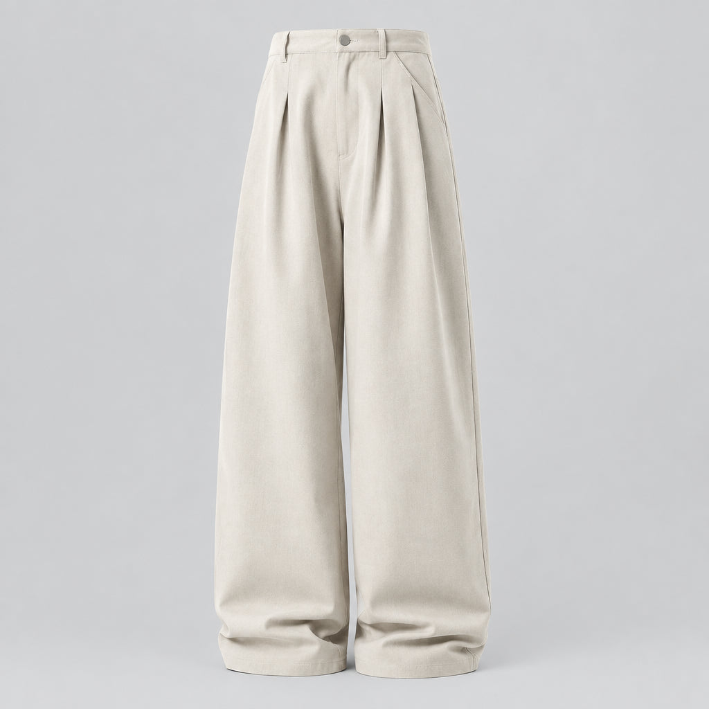 Stone washed pleated wide-leg trousers with front pleats and buttoned waistband.