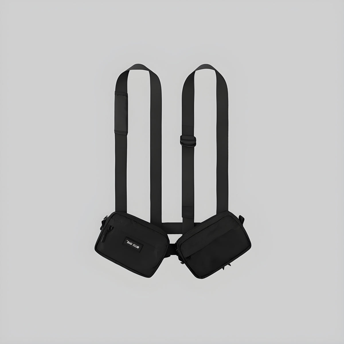 Black harness rig with two side pouches and adjustable straps
