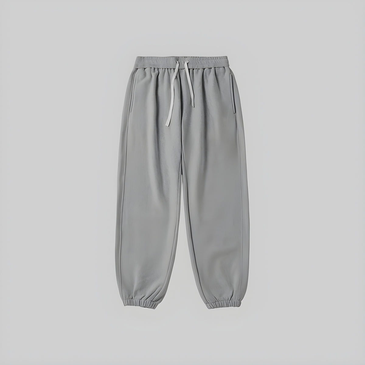 Brushed relaxed sweatpants in heather gray, elastic waistband with drawstring, cuffed hems