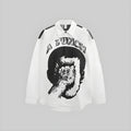 Ivory seersucker button-up shirt with black portrait graphic, long sleeves and collar