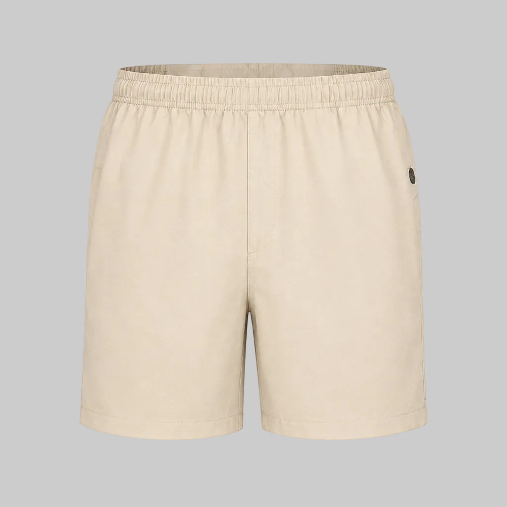 Technical Velocity short in pale khaki, elastic waistband and side pockets, straight leg.