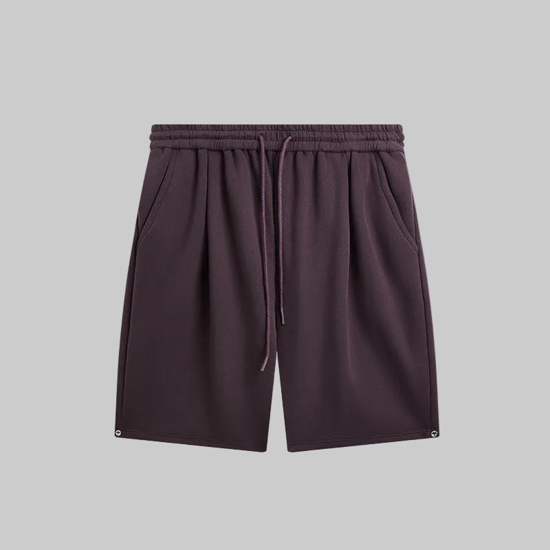 Relaxed utility shorts in dark plum with elastic waistband and drawstring tie