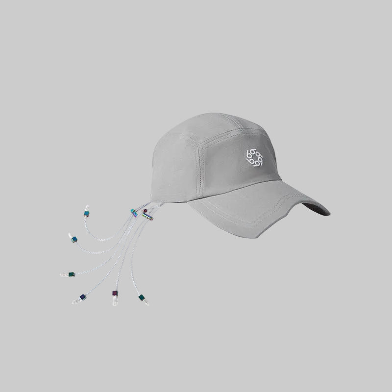 Light gray photochromic cap with front logo and multicolor hanging cords