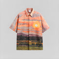 Seersucker short-sleeve button-up shirt with abstract landscape print in orange and dark brown