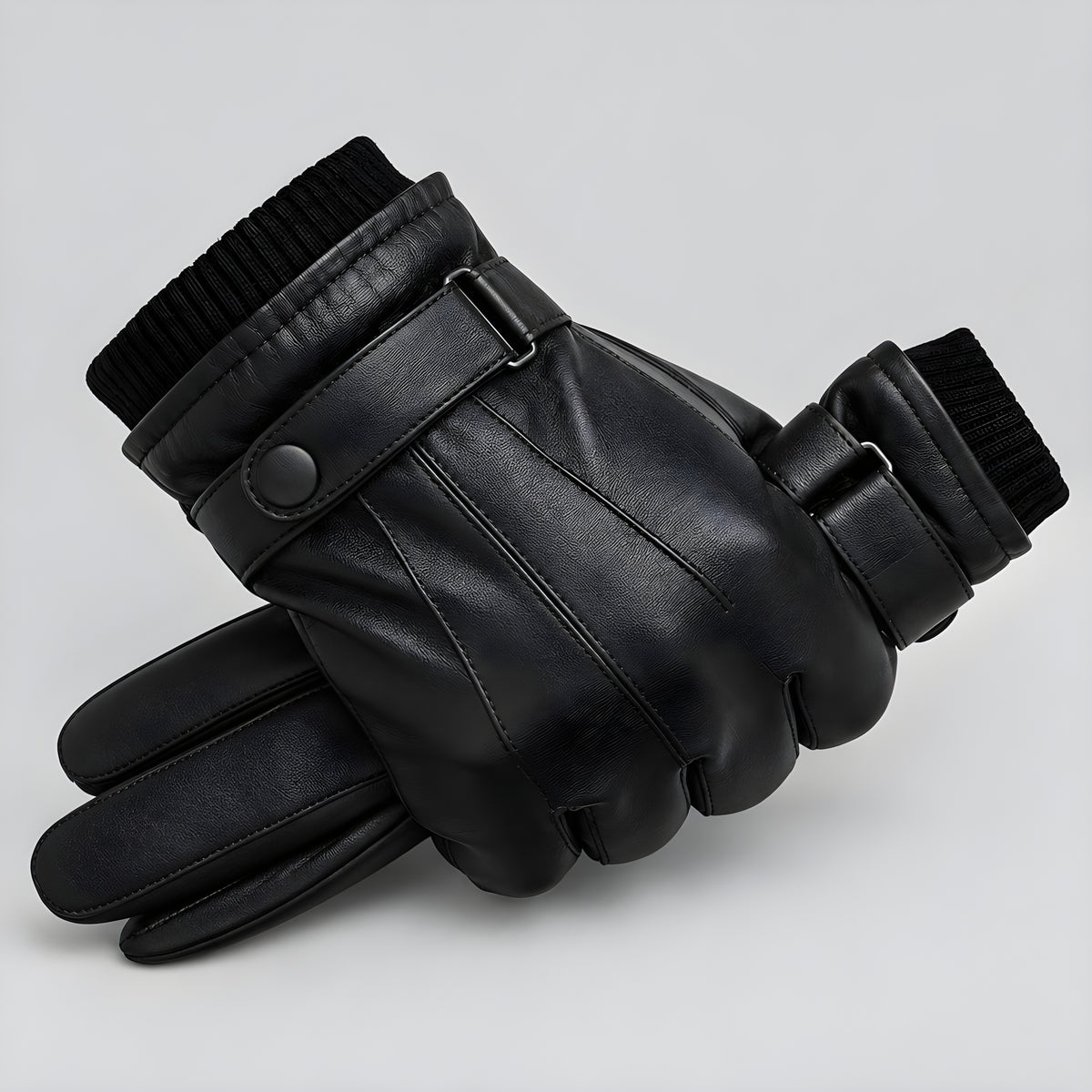 Black shearling leather gloves with ribbed knit cuff and side buckle straps