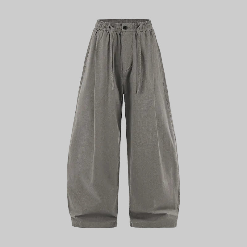 Light gray linen wide-leg trousers with elastic waist, button front, pleated legs