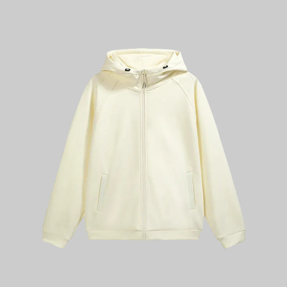 Hooded hardshell jacket in ivory with full-zip front and two side zip pockets.